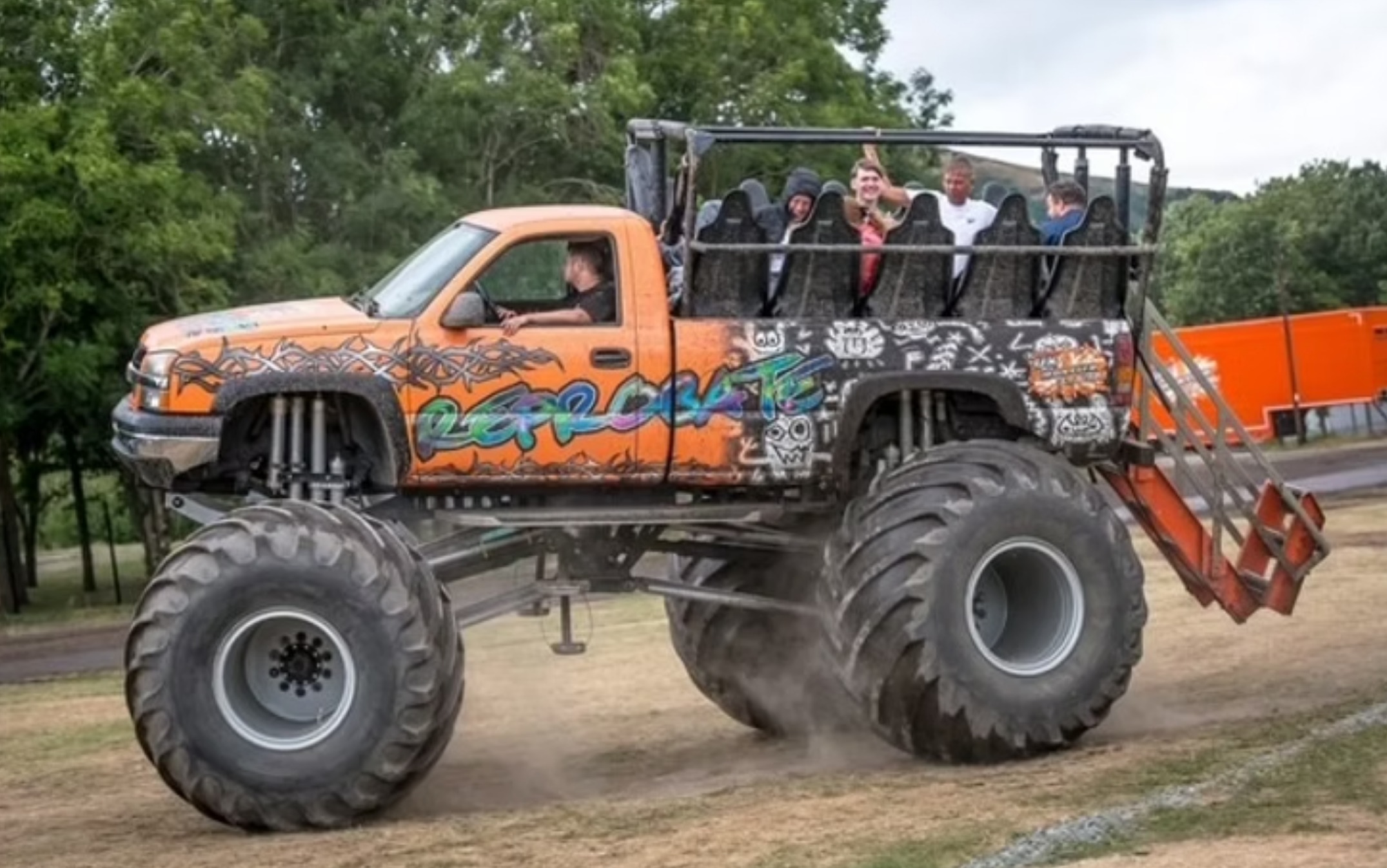 Family riding in a monster truck
