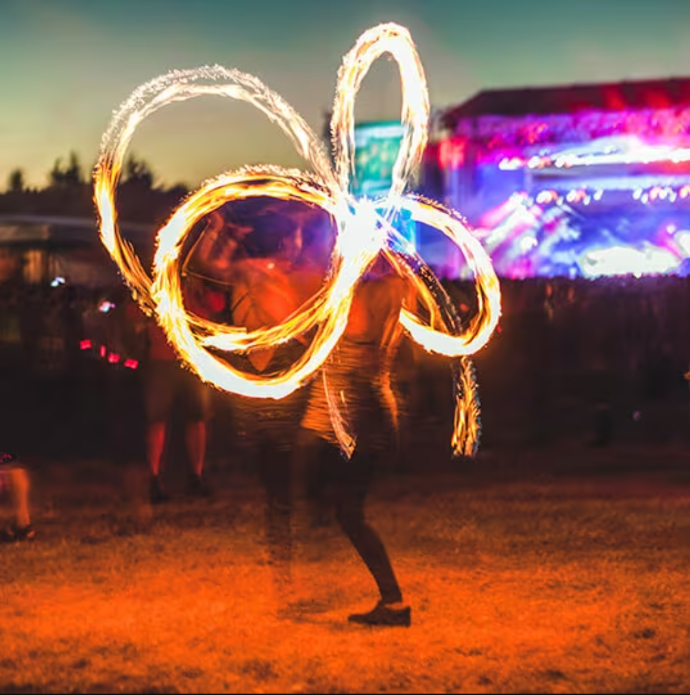 Ribbon and poi dancers performing