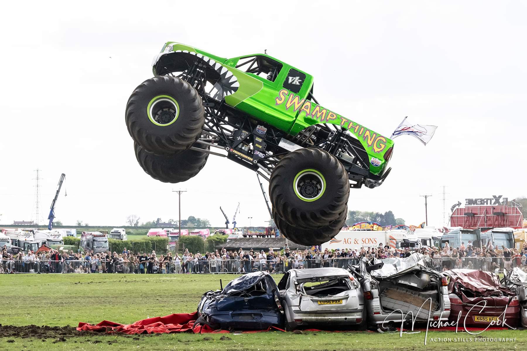 Swamp Thing monster truck crushing cars
